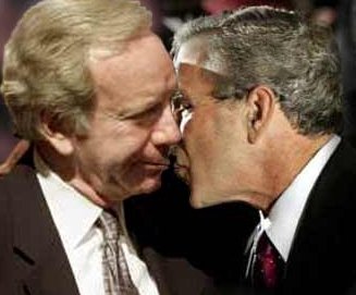 George W. Bush kissing Lieberman